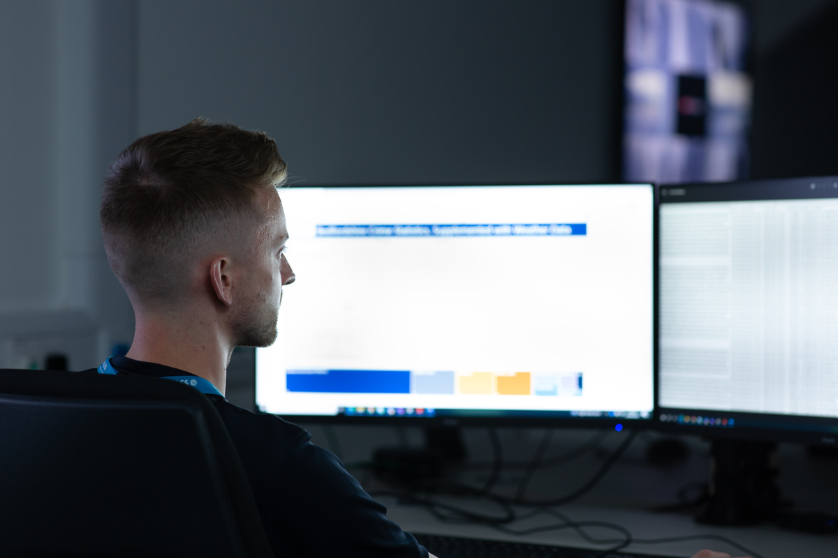 MASS staff member at their desk